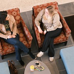 Students chat in the W&M School of Education lobby.