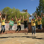 W&M students jumping for joy at the gorgeous weather during DFAS!