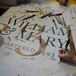 Students sign a poster in honor of W&M's 331st "birthday."