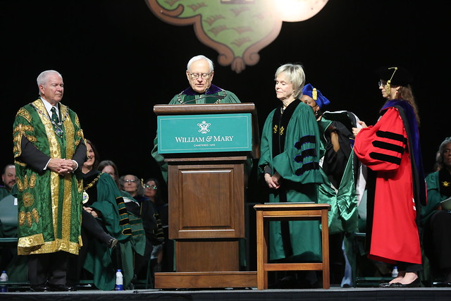Barbara “Bobbie” Berkeley Ukrop ’61, right, stands at the podium with W&M Chancellor Robert M. Gates ’65, L.H.D. ’98, left, and Rector Charles Poston J.D. ’74. Ukrop received an honorary degree during the Charter Day ceremony.