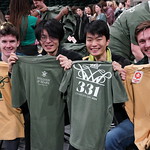 Students show off the T-shirts that were being given out for Charter Day 2024.