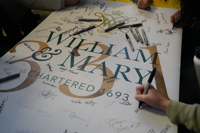 Students sign a poster in honor of W&M's 331st "birthday."